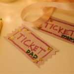 Event staff managing ticket sales and registration at a sporting event with organized check-in procedures