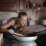 Stylish induction cooktop protection mat in leather with metallic finish, protecting the cooktop surface while expanding kitc