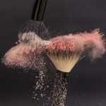 Foundation brush application technique for even makeup distribution and professional finish on the face