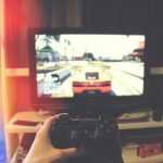 Gaming monitor displaying high-quality graphics with low latency performance for competitive gaming advantage