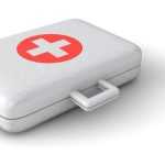 Well-stocked first aid kit with bandages, medications, and supplies essential for travelers