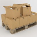 Advanced folding box gluing machine in operation, processing cardboard sheets with precision for automated packaging producti