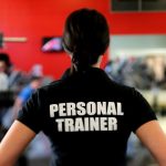 Personal Training in Köln session showing trainer providing guidance to client during customized fitness workout