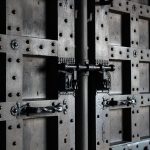 Professional locksmith in Hamburg installing automatic multi-point locking system for enhanced home security