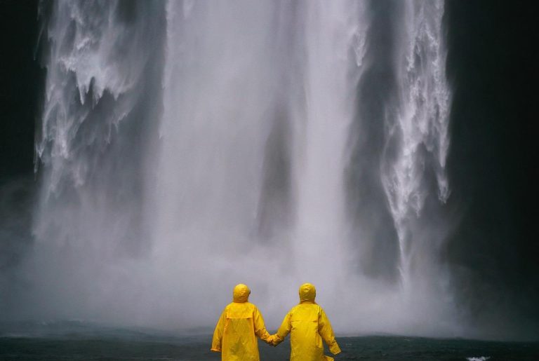 Women's rain coats for winter with thermal lining, waterproof design, and elegant tailoring for icy weather protection